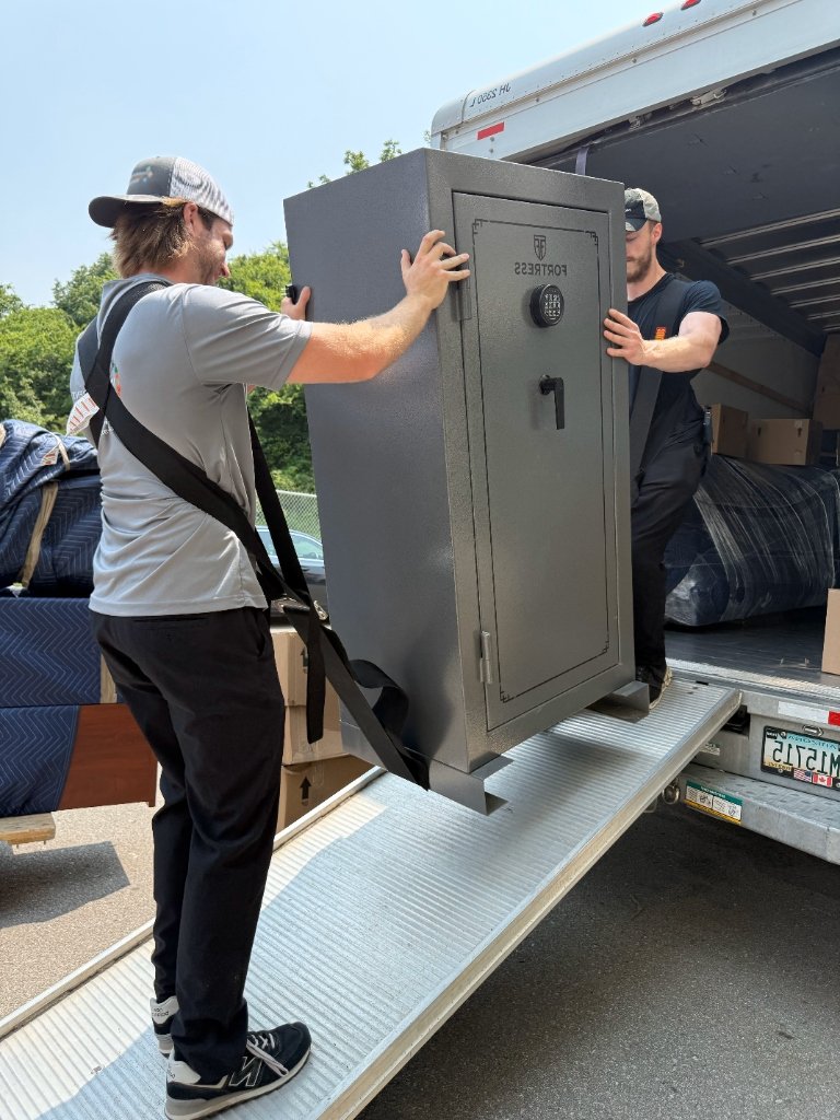 Giga Moving crew moving a safe